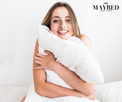 girl sleeping with white pillow